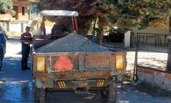 Dere yatağından kum alan şahıs jandarmaya takıldı
