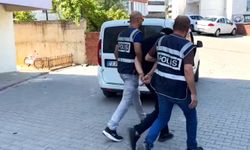 Telefon dolandırıcısı altın ve parayı almaya geldiği binada yakalandı