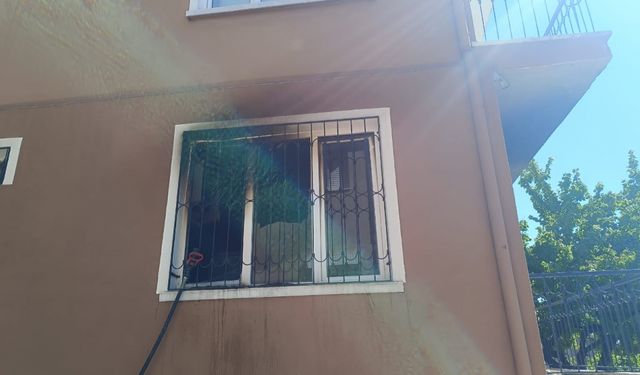 Aksaray'da apartmanda çıkan yangına müdahale eden kişi dumandan etkilendi