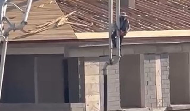 Beton pompasını asansör gibi kullandı, metrelerce yüksekliğe çıktı